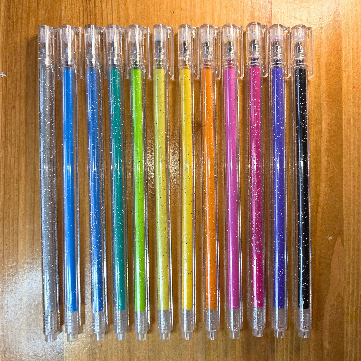 12 glitterpenne, 1 mm spids